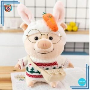 Peluche cochon habillé pull Noël