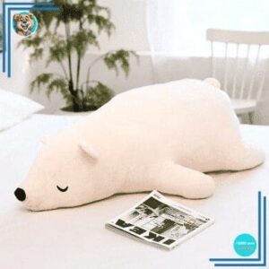 Peluche ours blanc qui dort